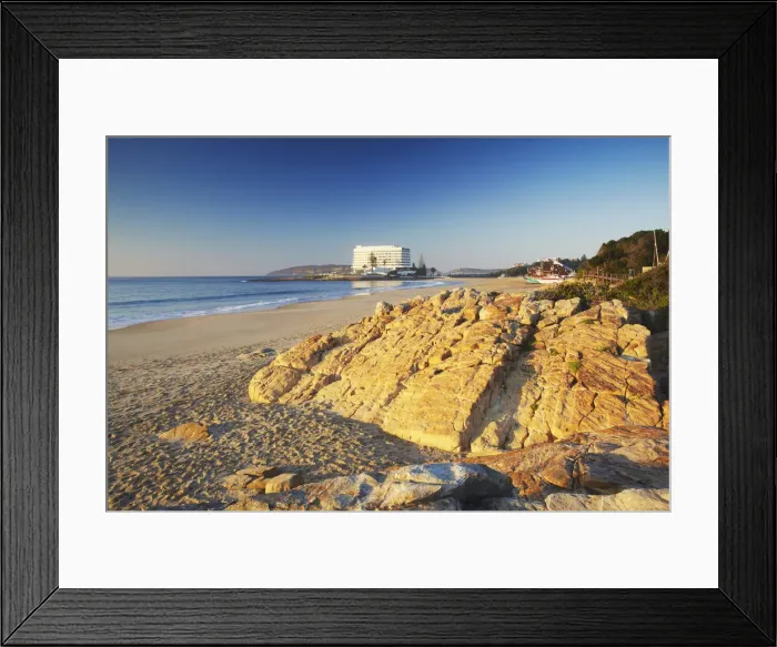 Framed Print : Plettenberg Bay beach at dawn with Beacon Island Hotel in background, Western Cape Framed Print : Plettenberg Bay beach at dawn with Beacon Island Hotel in background, Western Cape