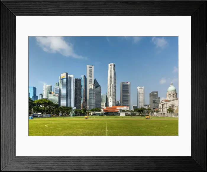Framed Print : Padang field and financial district skyline, Singapore Framed Print : Padang field and financial district skyline, Singapore
