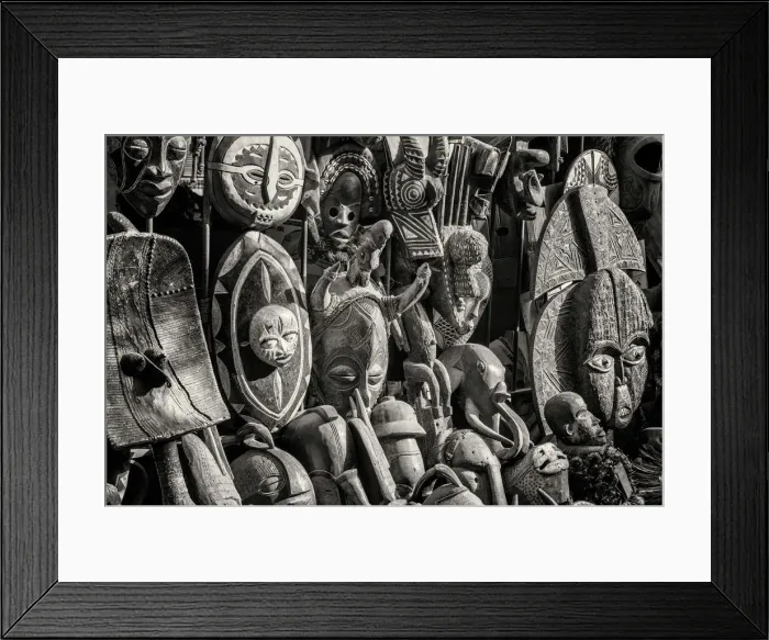 Framed Print : Africa, Senegal, Dakar. Artisanal wooden masks outside the food market