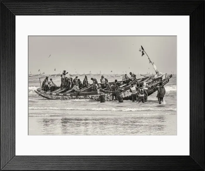 Framed Print : Africa, Senegal, Kayar. Fishermen with their boat going out Framed Print : Africa, Senegal, Kayar. Fishermen with their boat going out
