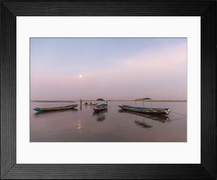 Framed Print : Africa, Senegal, Sine-Saloum-Delta. Moon rising above fishing boats in the delta Framed Print : Africa, Senegal, Sine-Saloum-Delta. Moon rising above fishing boats in the delta