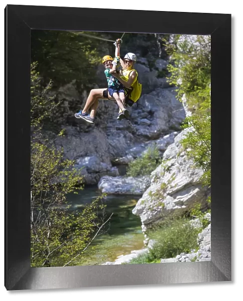 Slovenia, Goriska Region, Bovec. Ziplining in the Ucja Canyon in the Soca Valley