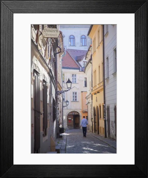 Framed Print : Man walking along street in Old Town, Bratislava, Slovakia Framed Print : Man walking along street in Old Town, Bratislava, Slovakia