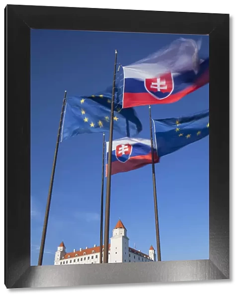 Slovakian and European Union flags of Parliament with Bratislava Castle, Bratislava