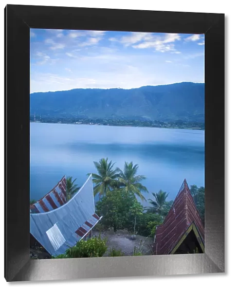 Indonesia, Sumatra, Samosir Island, Tuk Tuk, Typical Batak houses overlooking Lake Toba