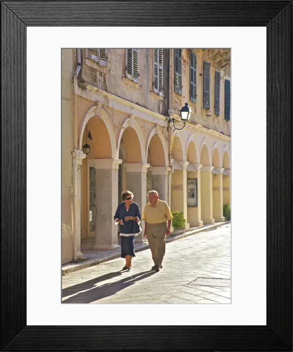 Framed Print : Couple Walking Through Corfu Old Town, Corfu, The Ionian Islands, Greek Islands, Greece Framed Print : Couple Walking Through Corfu Old Town, Corfu, The Ionian Islands, Greek Islands, Greece