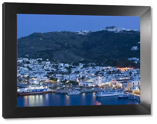 Greece, Dodecanese Islands, Patmos, Skala, View of Harbor & Hilltop Monastery of St