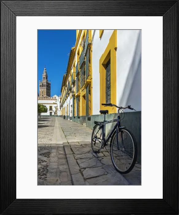 Framed Print : Plaza del Pato de Banderas with Giralda bell tower in the background, Seville, Andalusia Framed Print : Plaza del Pato de Banderas with Giralda bell tower in the background, Seville, Andalusia