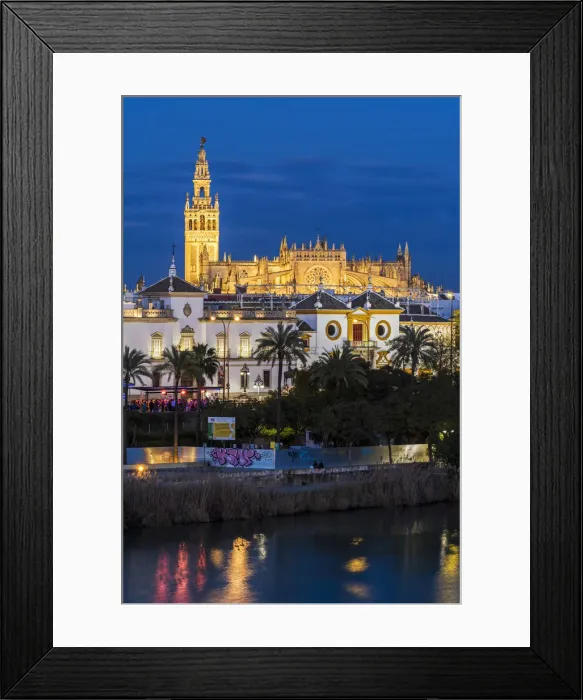 Framed Print : Night view of city skyline with Cathedral and Giralda bell tower, Seville, Andalusia Framed Print : Night view of city skyline with Cathedral and Giralda bell tower, Seville, Andalusia