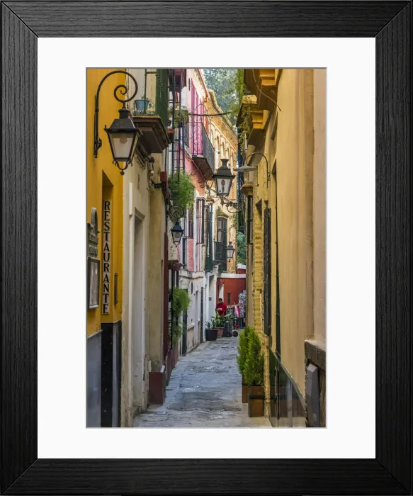 Framed Print : Colorful alley in Santa Cruz neighborhood, Seville, Andalusia, Spain Framed Print : Colorful alley in Santa Cruz neighborhood, Seville, Andalusia, Spain
