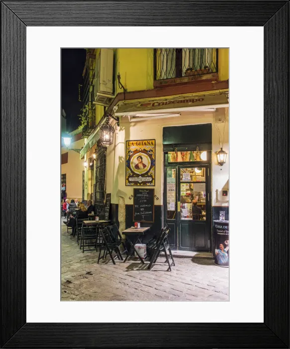 Framed Print : Night view of a tapas bar in Santa Cruz neighborhood, Seville, Andalusia, Spain