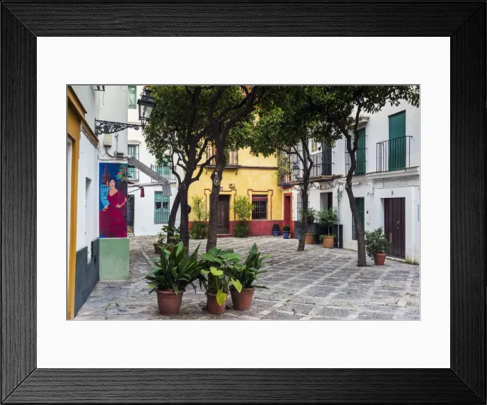 Framed Print : Picturesque small square in Santa Cruz neighborhood, Seville, Andalusia, Spain Framed Print : Picturesque small square in Santa Cruz neighborhood, Seville, Andalusia, Spain