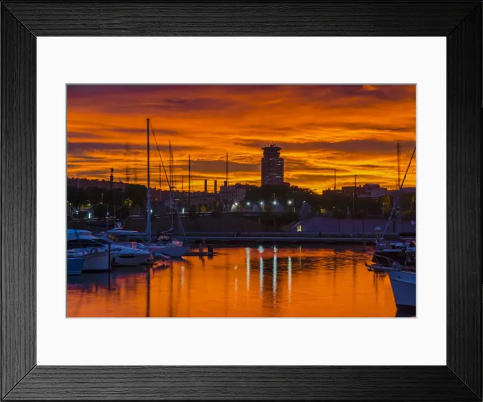 Framed Print : View of Port Vell harbor at sunset with dramatic red sky, Barcelona, Catalonia, Spain Framed Print : View of Port Vell harbor at sunset with dramatic red sky, Barcelona, Catalonia, Spain