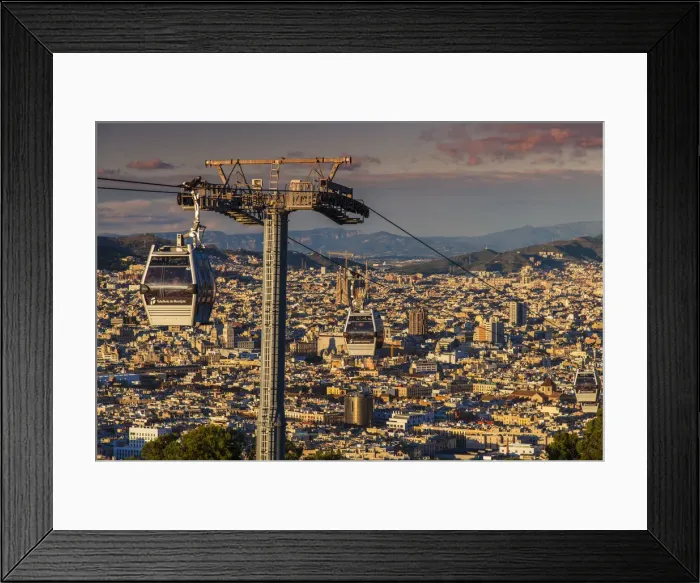 Framed Print : Teleferic de Montjuic or aerial tramway with city skyline at sunset, Barcelona, Catalonia Framed Print : Teleferic de Montjuic or aerial tramway with city skyline at sunset, Barcelona, Catalonia