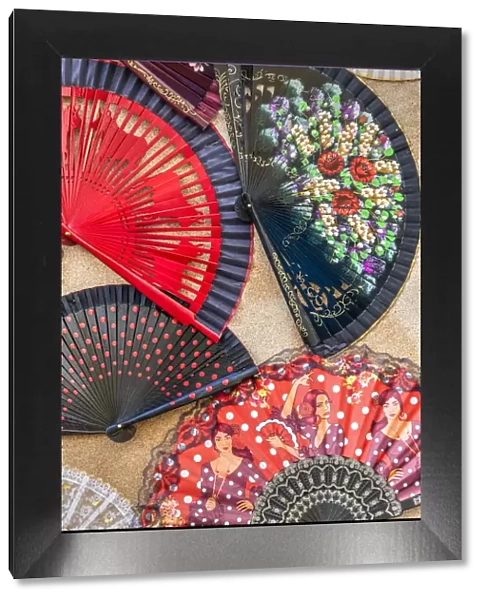 Typical Spanish folding hand fan for sale in a tourist shop, Arcos de la Frontera