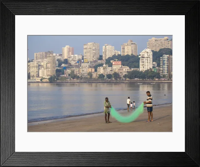 Framed Print : India, Maharashtra, Mumbai, Chowpatty, Men with fishing net on beach