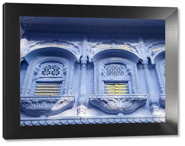 India, Rajasthan, Pushkar, Ornate windows on blue house