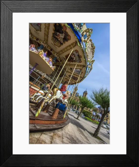 Framed Print : Merry-go-round with Ayuntamiento or Town Hall behind, Donostia San Sebastian, Gipuzkoa Framed Print : Merry-go-round with Ayuntamiento or Town Hall behind, Donostia San Sebastian, Gipuzkoa