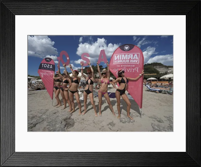 Framed Print : Promotion teams of the big clubs advertise in front of the Sa Trinxa- Beach Bar, Platja Framed Print : Promotion teams of the big clubs advertise in front of the Sa Trinxa- Beach Bar, Platja