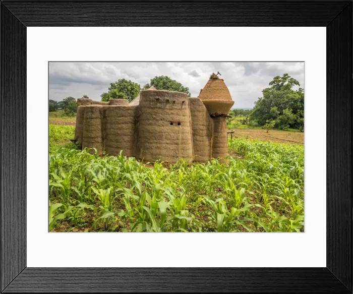 Framed Print : Africa, Togo, Koutammakou area. Landscape with tata somba, a traditional tribal village Framed Print : Africa, Togo, Koutammakou area. Landscape with tata somba, a traditional tribal village