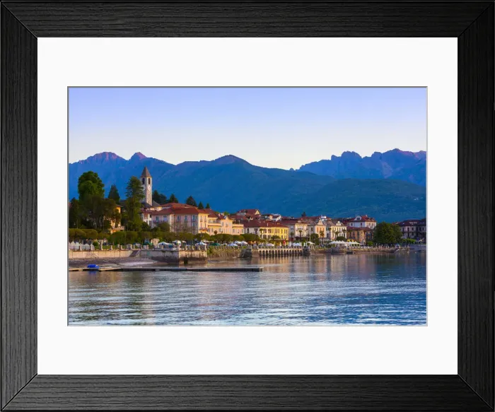 Framed Print : The idyllic lakeside village of Baveno illuminated at dawn, Lake Maggiore, Piedmont Framed Print : The idyllic lakeside village of Baveno illuminated at dawn, Lake Maggiore, Piedmont