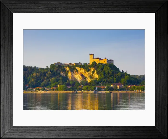 Framed Print : The imposing La Rocca fortress viewd from Arona at sunset, Lake Maggiore, Piedmont, Italy