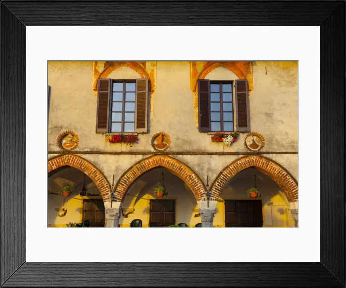 Framed Print : Old Town Building Facade illuminated at sunrise, Arona, Lake Maggiore, Piedmont, Italy Framed Print : Old Town Building Facade illuminated at sunrise, Arona, Lake Maggiore, Piedmont, Italy