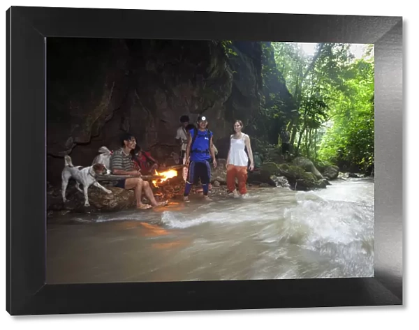 South East Asia, Thailand, North, Mae Hong Son, trekkers enter a river-cut cave with