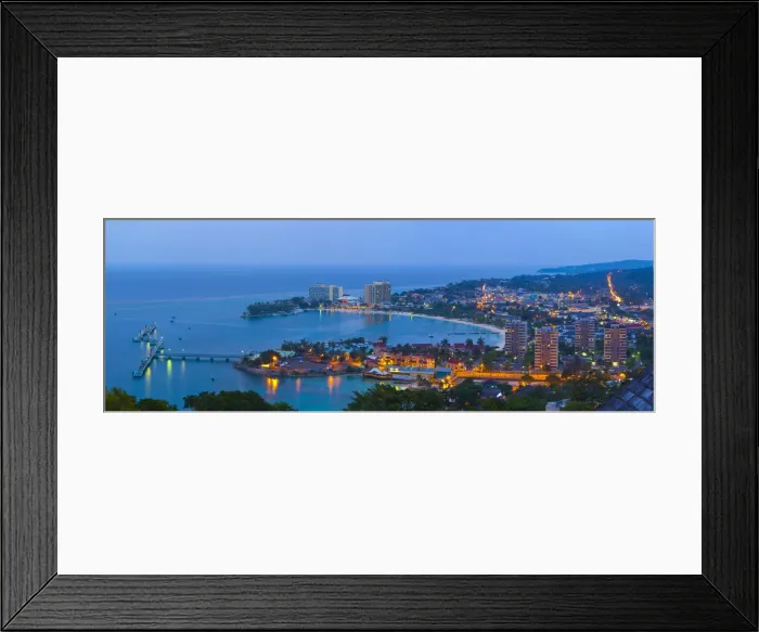 Framed Print : Elevated view over city & coastline illuminated at dusk, Ocho Rios, St. Ann Parish Framed Print : Elevated view over city & coastline illuminated at dusk, Ocho Rios, St. Ann Parish