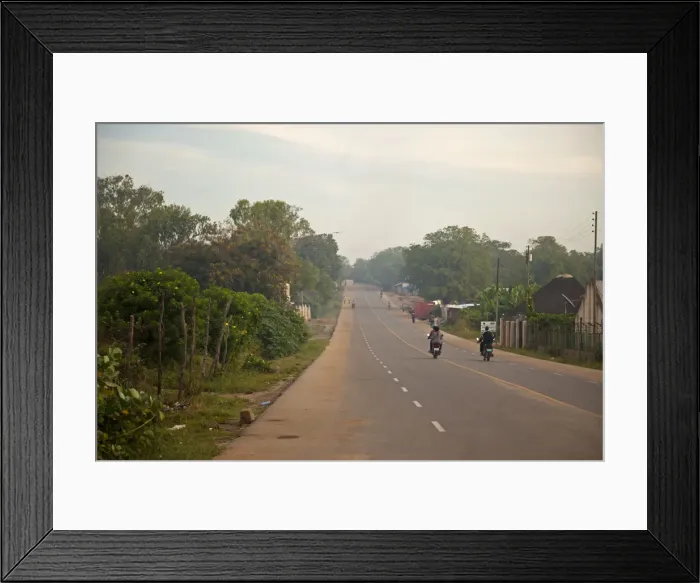 Framed Print : Juba, South Sudan. A main street used to transport good into the city Framed Print : Juba, South Sudan. A main street used to transport good into the city