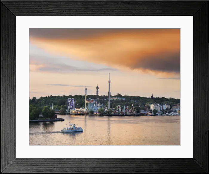 Framed Print : Sweden, Stockholm, Grona Lund Tivoli, passenger ferry in bay at dusk Framed Print : Sweden, Stockholm, Grona Lund Tivoli, passenger ferry in bay at dusk