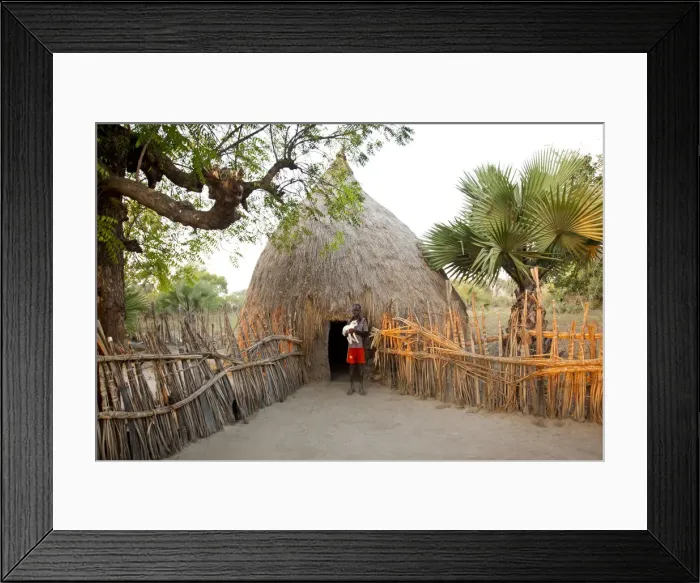 Framed Print : Leer, South Sudan. Ex child soldier with his goats Framed Print : Leer, South Sudan. Ex child soldier with his goats