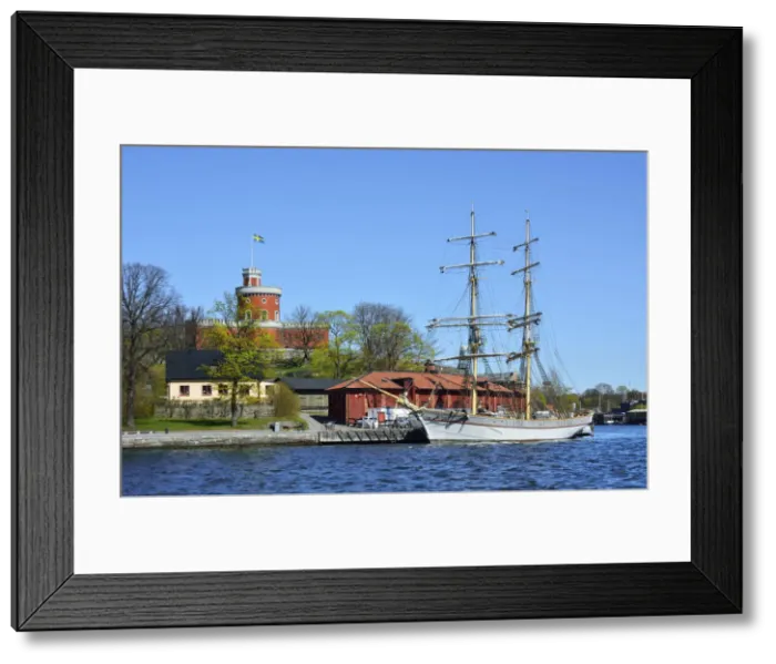Framed Print : Sailing ship docked on the shore in Kastellholmen. Stockholm, Sweden Framed Print : Sailing ship docked on the shore in Kastellholmen. Stockholm, Sweden