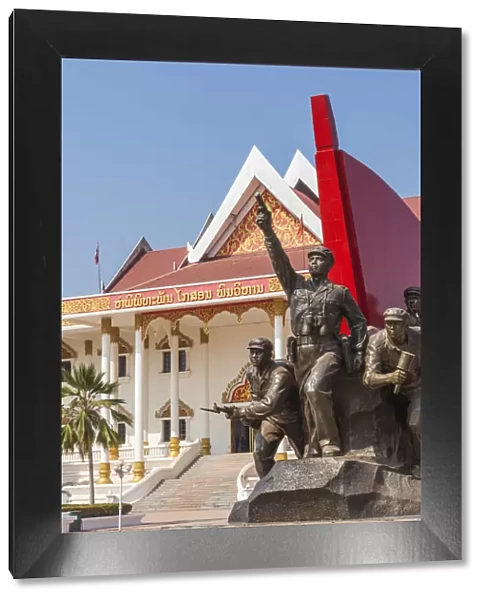 Laos, Vientiane, Kaysone Phomivan Museum, building exterior and revolutionary sculpture