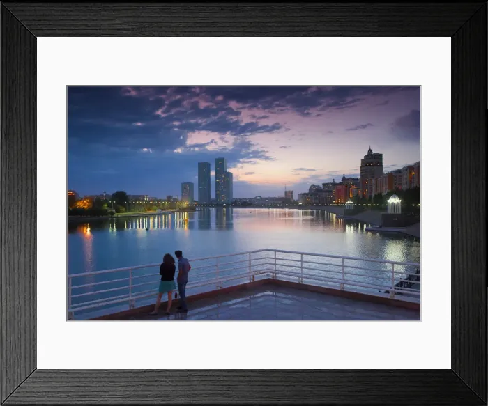 Framed Print : Kazakhstan, Astana, Couple looking at city view from banks of Ishim River