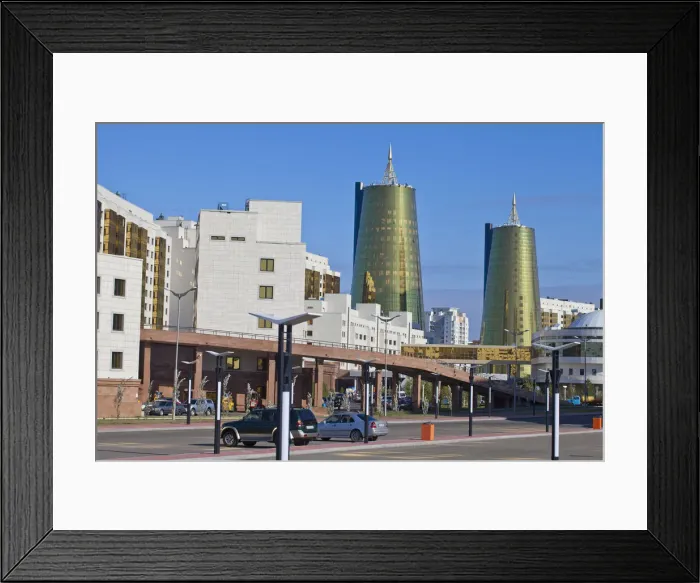 Framed Print : Kazakhstan, Astana, House of Ministries and twin golden conical business centres Framed Print : Kazakhstan, Astana, House of Ministries and twin golden conical business centres