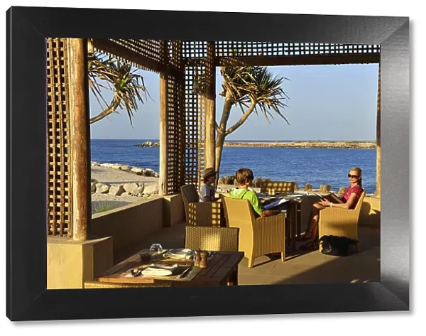 Family dining at the Anantara Desert Island Resort, Sir Bani Yas Island, Abu Dhabi