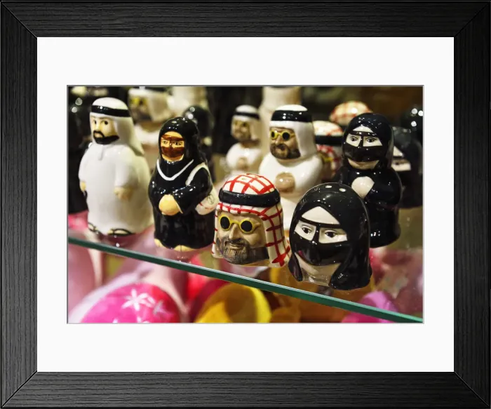 Framed Print : Models of a Sheikh with a veiled woman as salt and pepper shakers, Anantara Desert Framed Print : Models of a Sheikh with a veiled woman as salt and pepper shakers, Anantara Desert