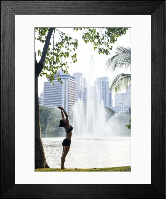 Framed Print : Asia, South East Asia, Thailand, Bangkok, Lumphini Park, a Caucasian woman practising Framed Print : Asia, South East Asia, Thailand, Bangkok, Lumphini Park, a Caucasian woman practising