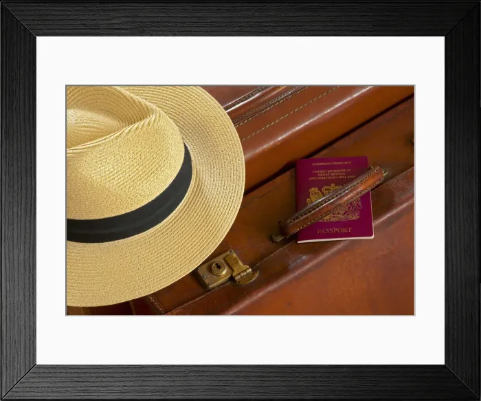 Framed Print : Vintage Leather Suitcase with Panama Hat and British Passport Framed Print : Vintage Leather Suitcase with Panama Hat and British Passport