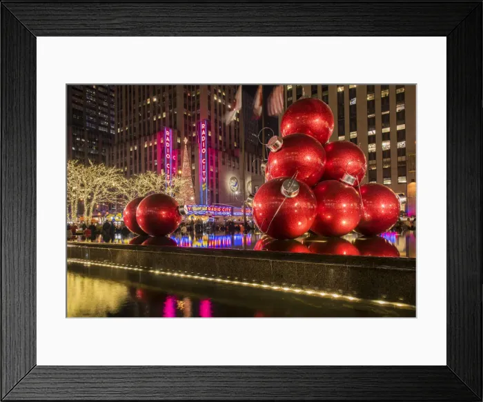 Framed Print : Giant red Christmas ornaments on display on Avenue of Americas (6th Avenue) during Framed Print : Giant red Christmas ornaments on display on Avenue of Americas (6th Avenue) during
