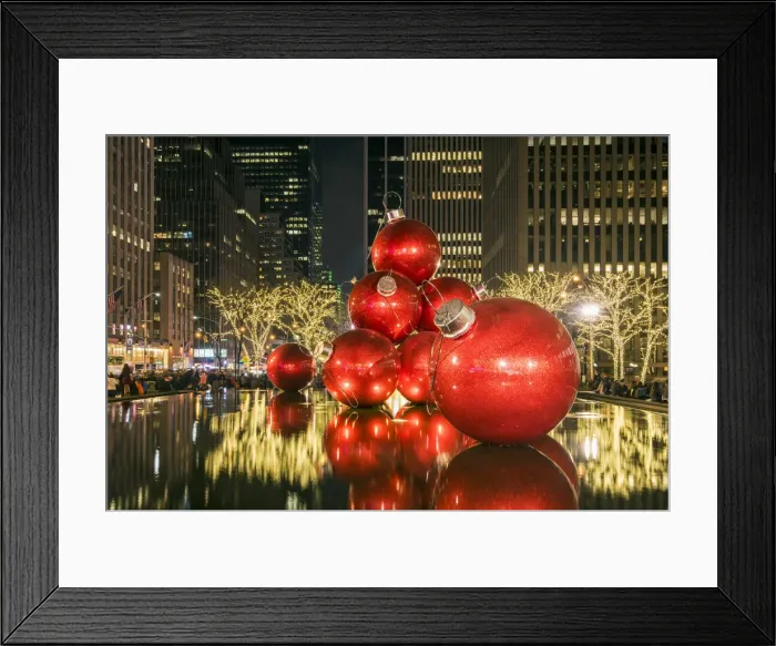 Framed Print : Giant red Christmas ornaments on display on Avenue of Americas (6th Avenue) during