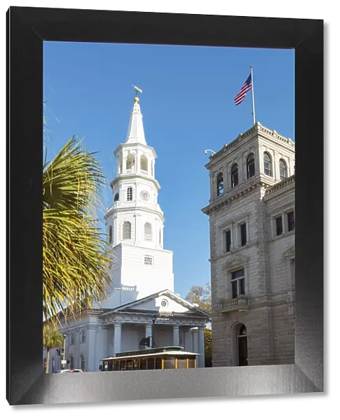 USA, South Carolina, Charleston. Tram passing under St. Michaels Episcopal Church