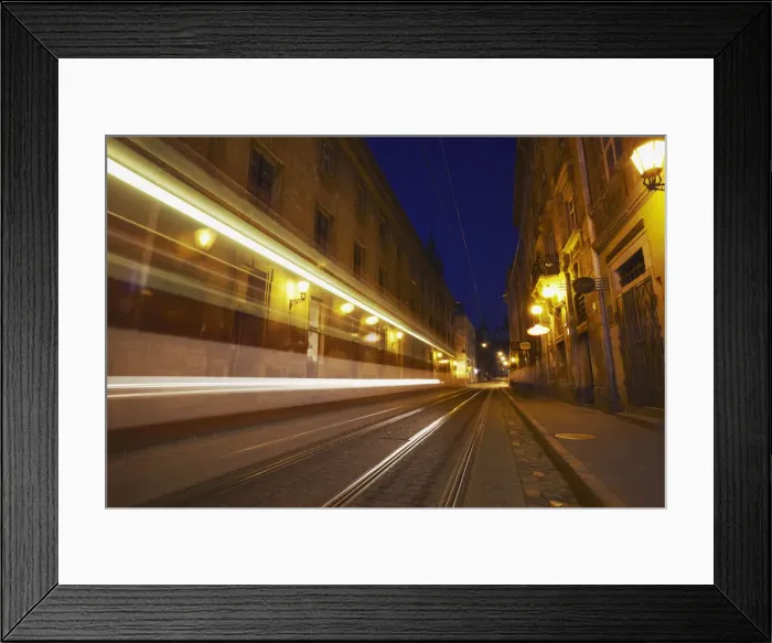 Framed Print : Tram passing along Ruska Street at dusk, Lviv, Ukraine Framed Print : Tram passing along Ruska Street at dusk, Lviv, Ukraine