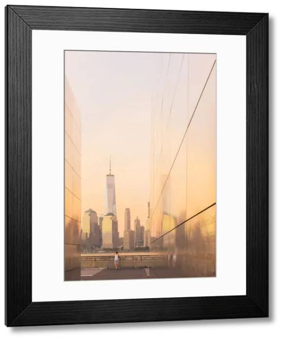 Framed Print : Woman enjoying the view to Manhattan from Empty skies 9 / 11 memorial in Liberty state park Framed Print : Woman enjoying the view to Manhattan from Empty skies 9 / 11 memorial in Liberty state park