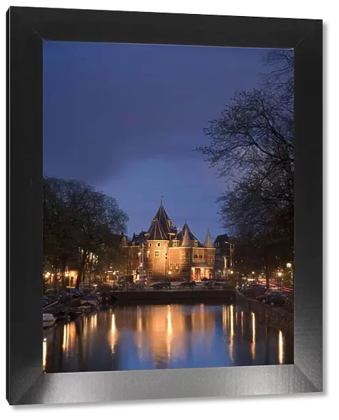 Kloveniers Burgwal canal and Waag Historic building, Nieuwmarkt, Amsterdam, Holland