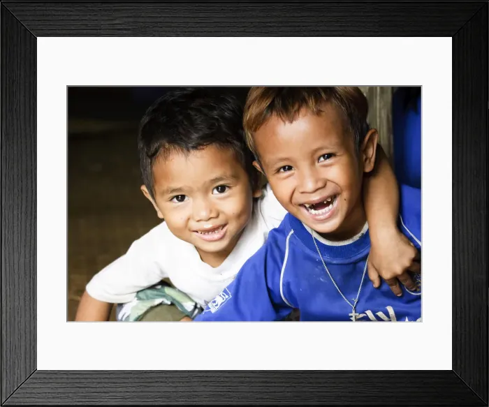 Framed Print : Iban young boys, traditional Longhouse (Communal House), Sarawak, Malaysian Borneo