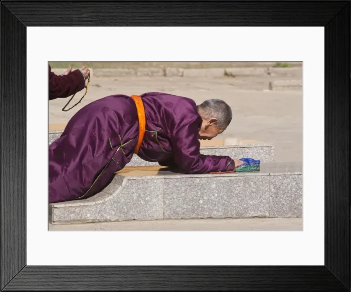 Framed Print : MONGOLIA, Ulaanbaatar, Monk prostrating at Gandan (Gandantegchenling) Monastery Framed Print : MONGOLIA, Ulaanbaatar, Monk prostrating at Gandan (Gandantegchenling) Monastery