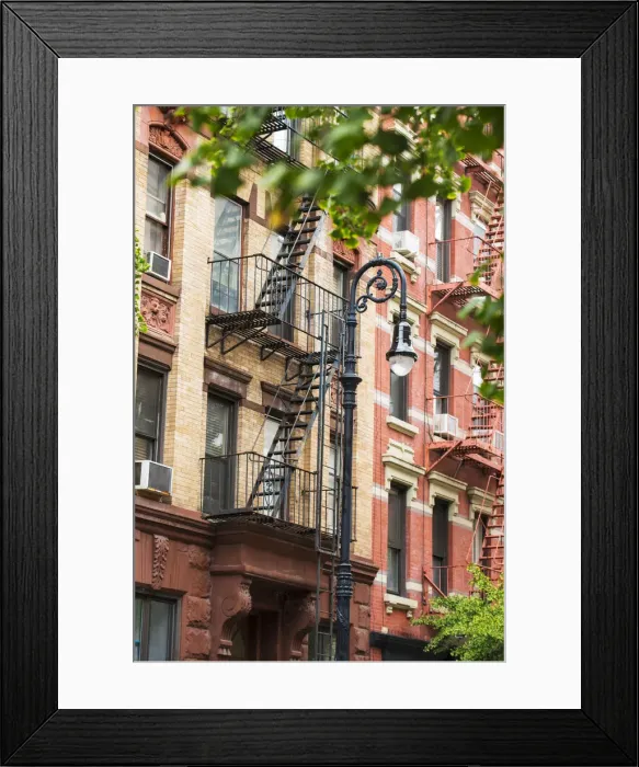 Framed Print : Fire Escapes and building exterior in the west village, New York, USA Framed Print : Fire Escapes and building exterior in the west village, New York, USA