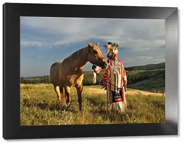 Lakota Indian in the Black Hills with Horse, Western South Dakota, USA. MR